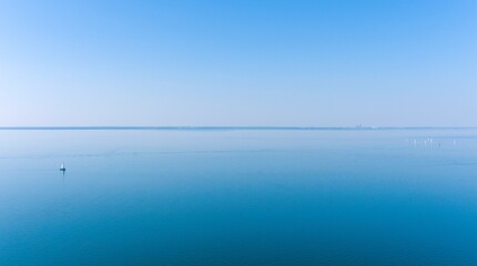 Aerial view of a sailboat in Mobile Bay