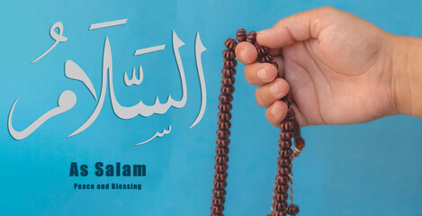 Hand of Muslim woman holding prayer beads, 99 Names of God, Muslim woman praying Name Of Allah As...