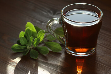 cup of herbal tea on wooden table