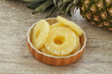 Marinated pineapple rings in the bowl
