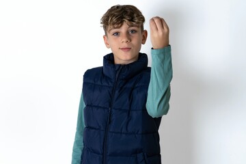 Caucasian teen boy angry gesturing typical italian gesture with hand, looking to camera