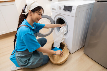 Professional housekeeper female services company team working at customer house washing dishes, laundry, kitchen cleaning, maid worker in small business partnership working together household task