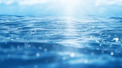 Naklejka na ściany i meble Beautiful blurred natural blue background with water