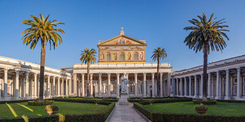 Fototapeta na wymiar Outside facade of the Papal Basilica of St. Paul outside the Walls (Basilica Papale di San Paolo fuori le Mura). Rome, Italy