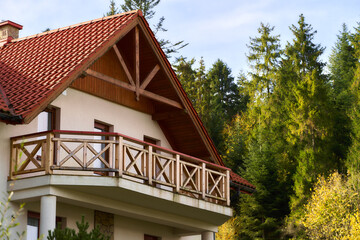 Mountain Style Wooden House in a Picturesque Landscape. Escape to a Modern Wooden Chalet Cabin Amidst Nature's Beauty
