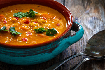 Dal soup - Indian delicious lentil soup on wooden background