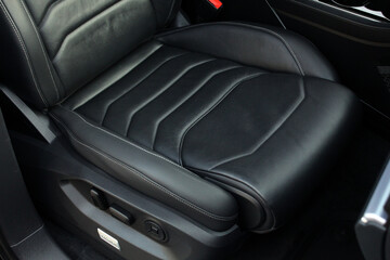 Passenger seats in modern luxury car. Interior of prestige modern car. Comfortable leather...