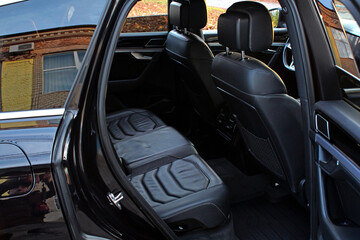 Back passenger seats in modern luxury car. Interior of prestige modern car. Comfortable leather...