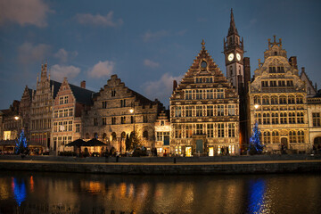 Fototapeta na wymiar Dusk view of the canal in Grass Quay at Christmas time, Ghent