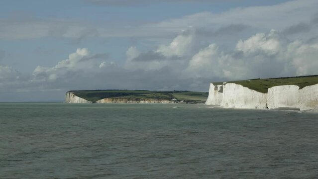 Time-lapse, clouds, waves, Seven Sisters chalk cliffs, Birling Gap near Eastbourne, East Sussex, England, United Kingdom, Europe