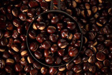 Close up view of chestnuts, agricultural harvest concept. Healthy, seasonal food
