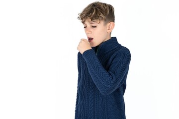 Caucasian teen boy feeling unwell and coughing as symptom for cold or bronchitis. Healthcare...