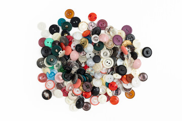 A bunch of colorful buttons on a white background