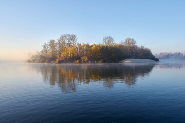 an island in the middle of the water, river, lake