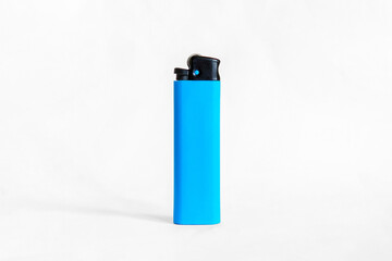 Blue plastic lighter on white background