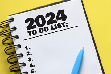 2024 Happy New Year Resolution Goal List and Plans Setting - Business office desk with notebook