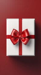 Elegant White Gift Box with Red Ribbon on Dark Background