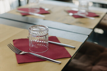 Table served for lunch in a street cafe on a sunny day.