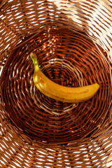 yellow banana in rattan basket
