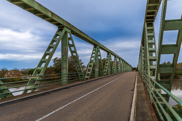 Fototapeta na wymiar Sylvéréal bridge on the Petit Rhône, border between Occitanie and Camargue Provence, France