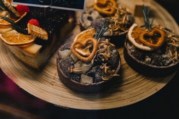 Close-up of chocolate desserts, candy bar. Custom-made confectionery for weddings, holidays.