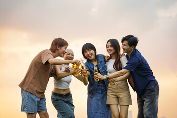 Image of group of friends celebrating and drinking beer together