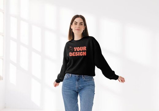 Mockup of woman wearing customizable sweatshirt, arms out