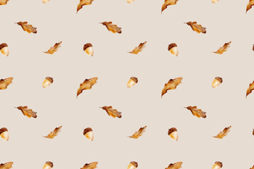 Simple pattern with oak leaves and acorns with light backdrop for any design. Digital watercolor illustration