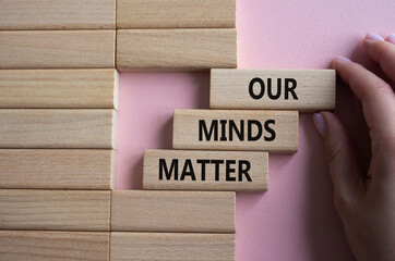 Our Minds Matter symbol. Concept words Our Minds Matter on wooden blocks. Doctor hand. Beautiful...