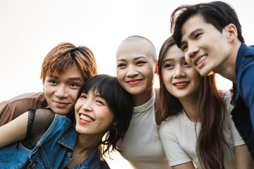 Obraz premium Image of a group of young Asian people laughing happily together
