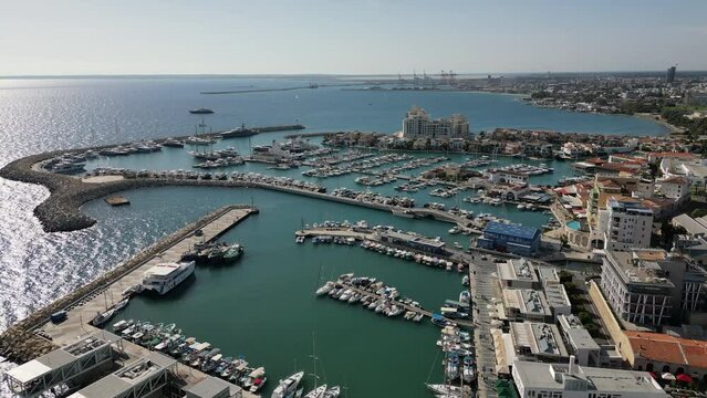 Aerial view of vessels (including fishing boats, yachts, sailing boats) moored in the marina of Lemesos (Limassol), Cyprus

