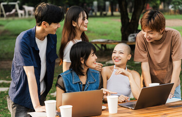 Image of a group of Asian students studying together