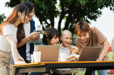 Image of a group of Asian students studying together
