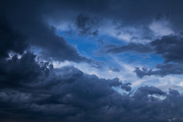 Naklejka na ściany i meble Epic Storm rain clouds, sky, blue dark clouds background texture, thunderstorm