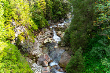 Fototapeta na wymiar stream flowing view river mountainous area