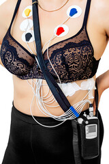 Woman with sensors of holter monitor device for daily monitoring of an electrocardiogram on her...