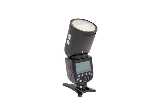 Irvine, Scotland, UK - October  26, 2023: Godox branded V1 (F) flash strobe  Made for the fuji camera systems for studio and off camera flash/strobe powered by godox li-ion rechargeable battery packs.
