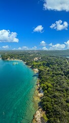 Vertical drone panorama over a stretch of coast near the town of Pula in Istria