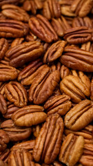 Fresh organic pecan nuts, close up