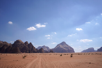 Fototapeta na wymiar Beautiful orange sands dune of Wadi Rum desert the unique landscape