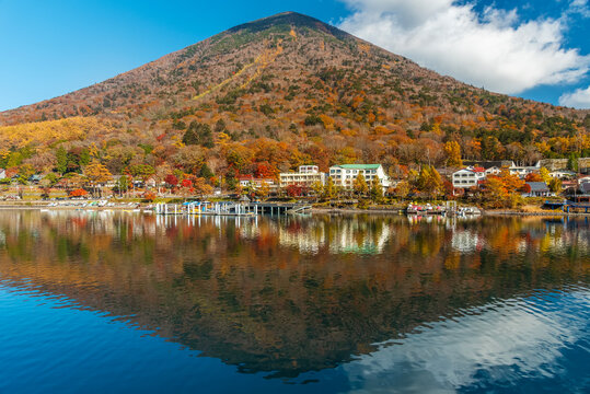Idyllic landscape of lake Chuzenji and mountain Nantai in Nikko national park, Japan