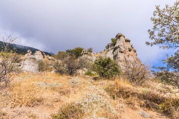 Mysterious mountain landscape of the Valley of Ghosts on the western slope of Mount Demerdzhi in Crimea. Popular tourism and trekking destination
