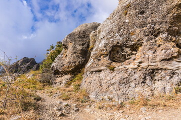 Mysterious mountain landscape of the Valley of Ghosts on the western slope of Mount Demerdzhi in Crimea. Popular tourism and trekking destination