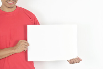 Delivery man holding blank paper with copy space, place for text image. Delivery service concept.