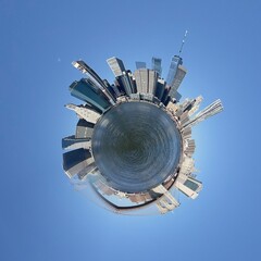 360 degree tiny planet view of Manhattan skyline and Brooklyn Bridge.