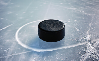Hockey puck on the ice, sport, winter, cold