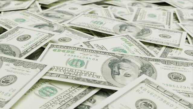 4k of scattered piles of money 100 us dollar