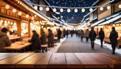 Empty table with blurred christmas or winter market in the background with copy space