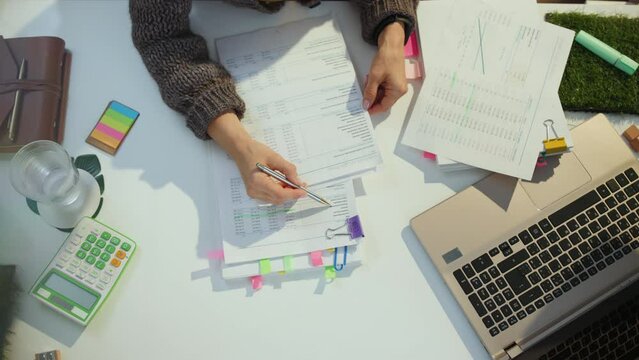 tax time. accountant woman working with documents.