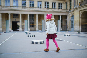 Child having fun in Paris, France. Happy kid playing outdoors